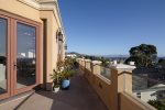 The wrap around deck is accessible from many areas of the home
